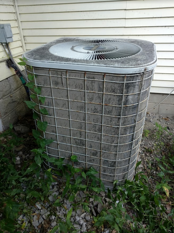 air conditioner maintenance- clean off debris